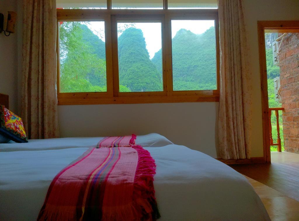 Отель Yangshuo Peaceful Valley Retreat Экстерьер фото