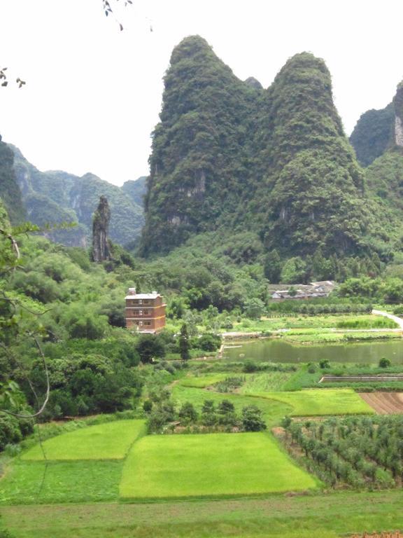 Отель Yangshuo Peaceful Valley Retreat Экстерьер фото