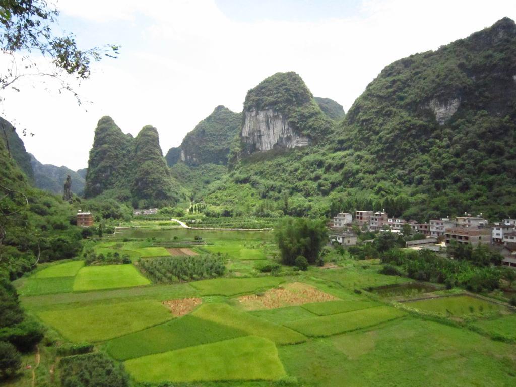 Отель Yangshuo Peaceful Valley Retreat Экстерьер фото